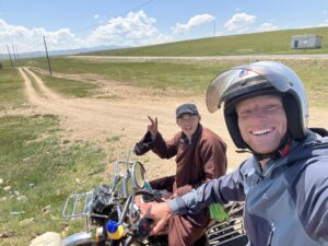 driving motorbike with local in mongolia