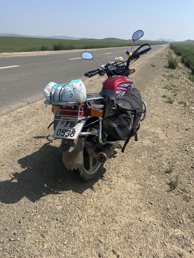 motorbike with flat tire mongolia