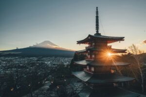 temple in japan with mount fuji in the background