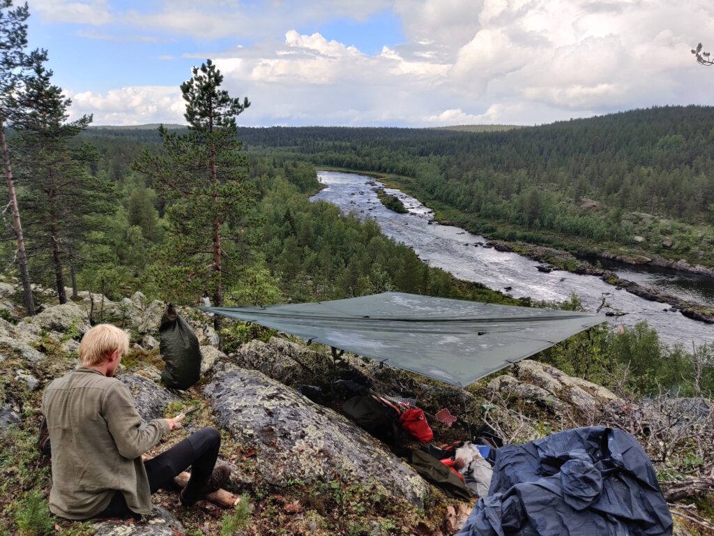 tarp shelter overlooking ivalojoki river